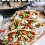 Three stuffed ground chicken pitas with Mediterranean toppings.