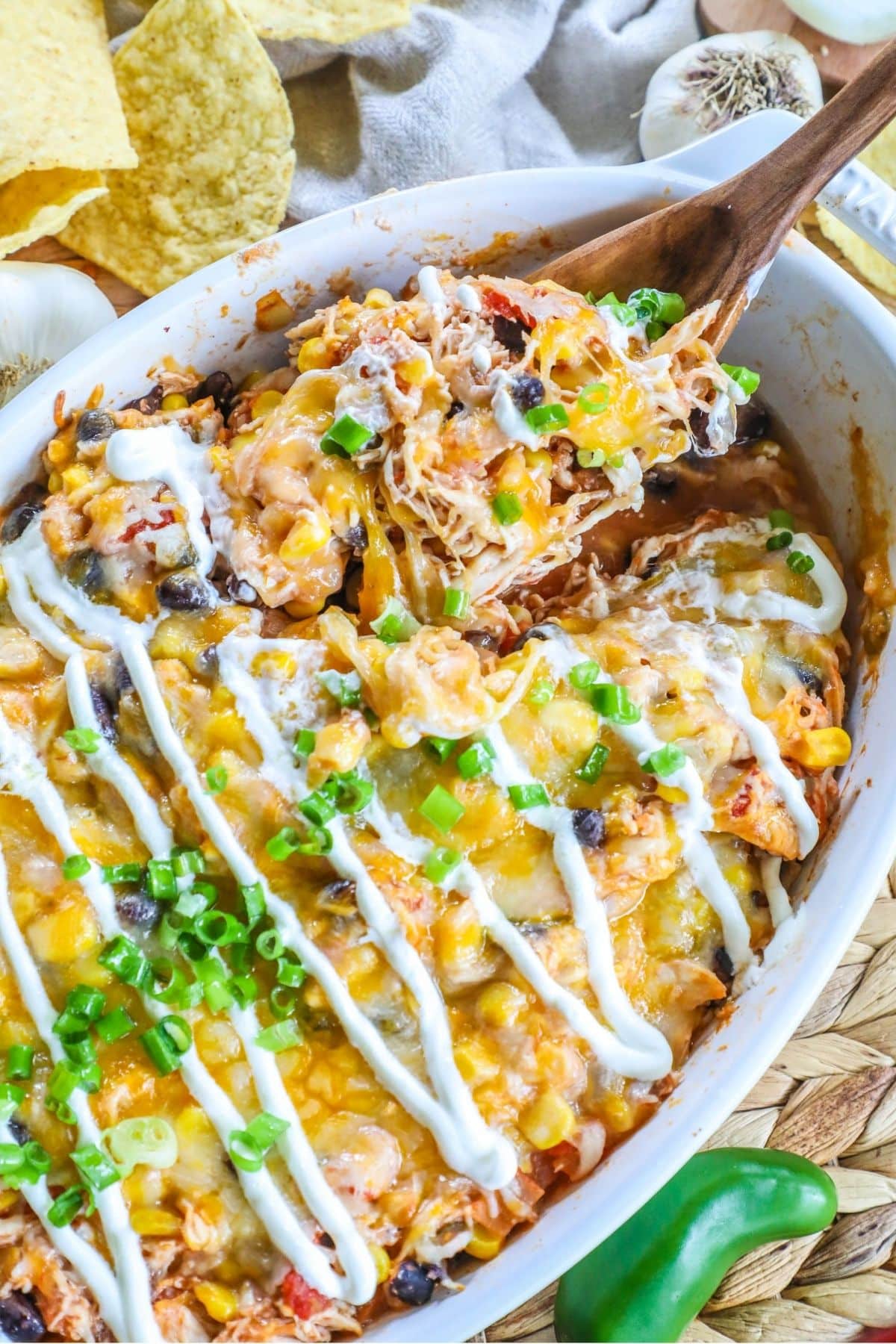 mexican shredded pork casserole ina. white baking dish