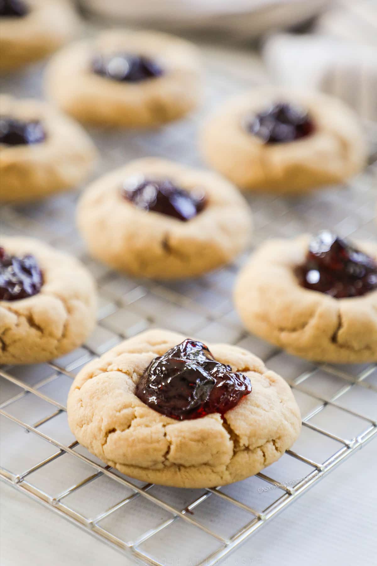 Finished Peanut Butter & Jelly Cookies on a cooking rack