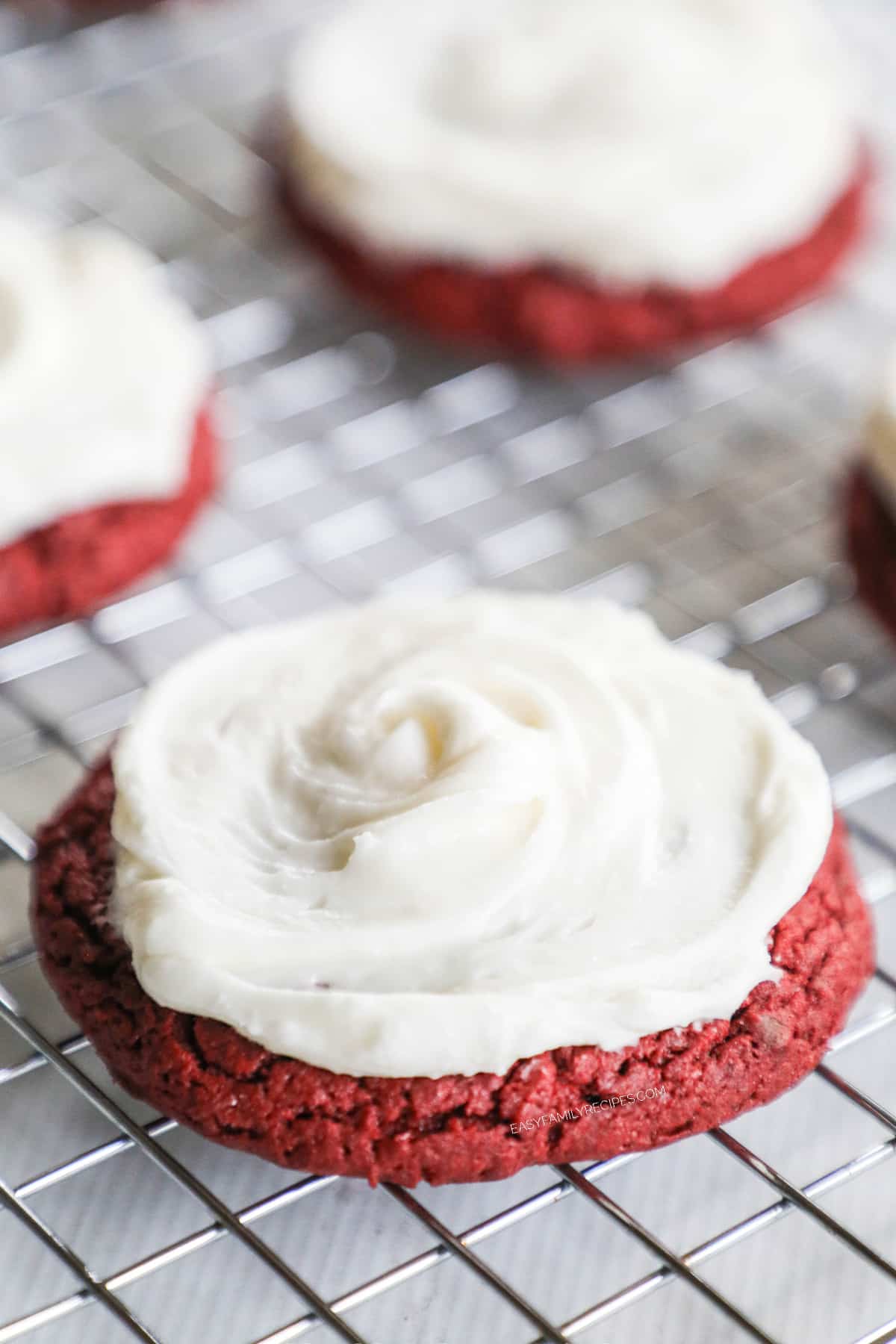 red velvet cookies with cake mix on a cooling rack.