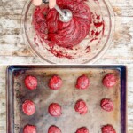 how to make red velvet cookies, 1)add cake mix, eggs, and oil to a mixing bowl, 2) mix until smooth, 3) portion onto a baking sheet, 4) bake, cool, then frost.