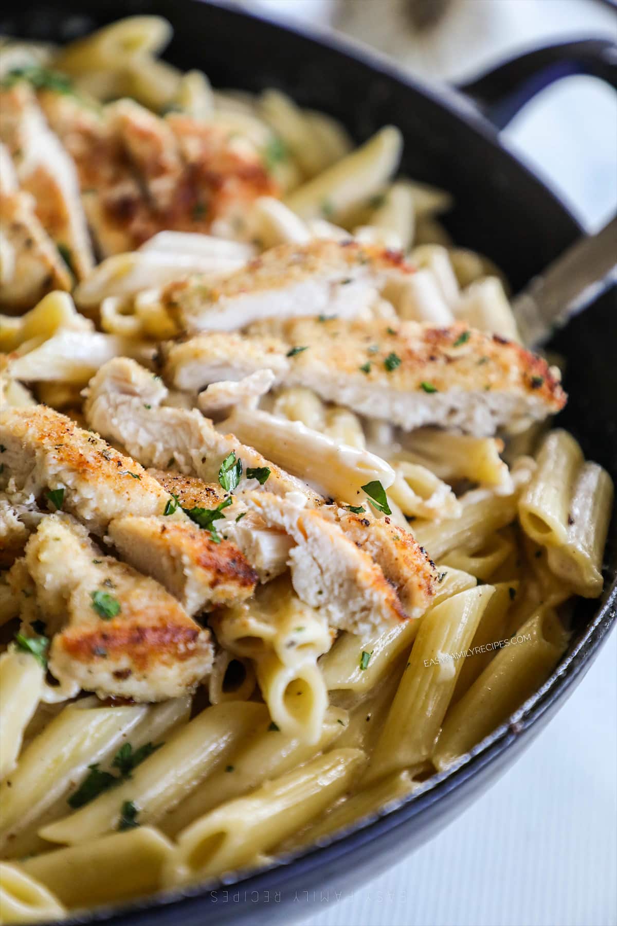 Garlic Parmesan Chicken Pasta in a skillet, ready to serve.