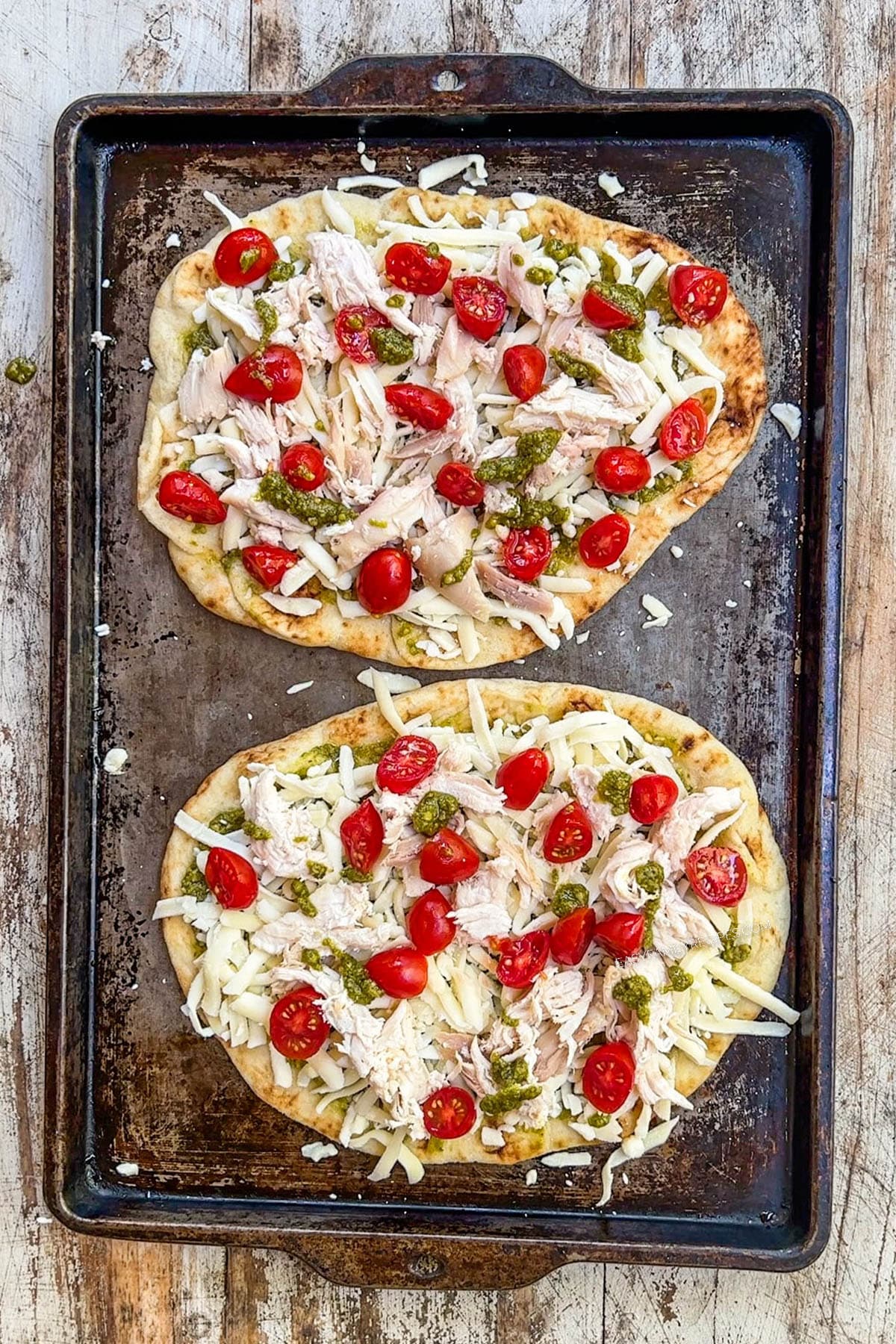 Chicken flatbread with pesto after baking.