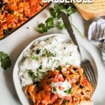 Southwest chicken casserole served on a white plate along with rice on a white background. The text reads, "Southwest Chicken Casserole."