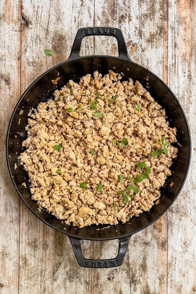 cooked, seasoned ground chicken in a skillet. 