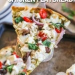 A server lifts a slice of Mediterranean Flatbread off of the baking sheet. The text reads, "Mediterranean Chicken Flatbread."