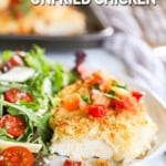 Monterey Jack Unfried Chicken on a white plate with a side salad next to it. The text reads, "Monterey Jack Unfried Chicken"