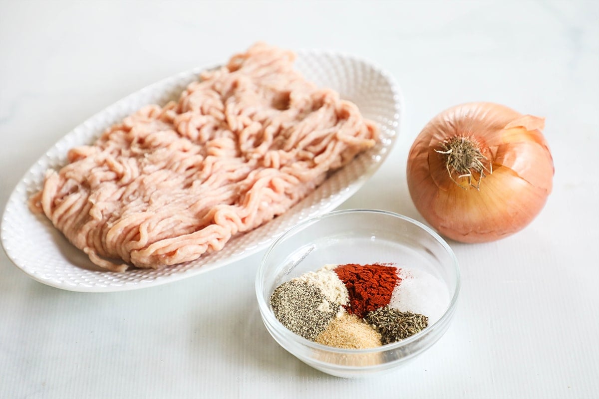 ingredients for ground chicken on the counter. 