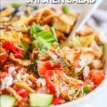 BBQ ranch chicken salad in a white bowl with a silver fork. The text reads, "BBQ Ranch Chicken Salad."