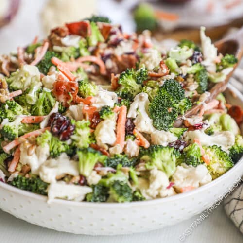 A white bowl filled with Broccoli Crunch Salad