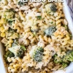 above image of baked broccoli alfredo pasta in a casserole dish.