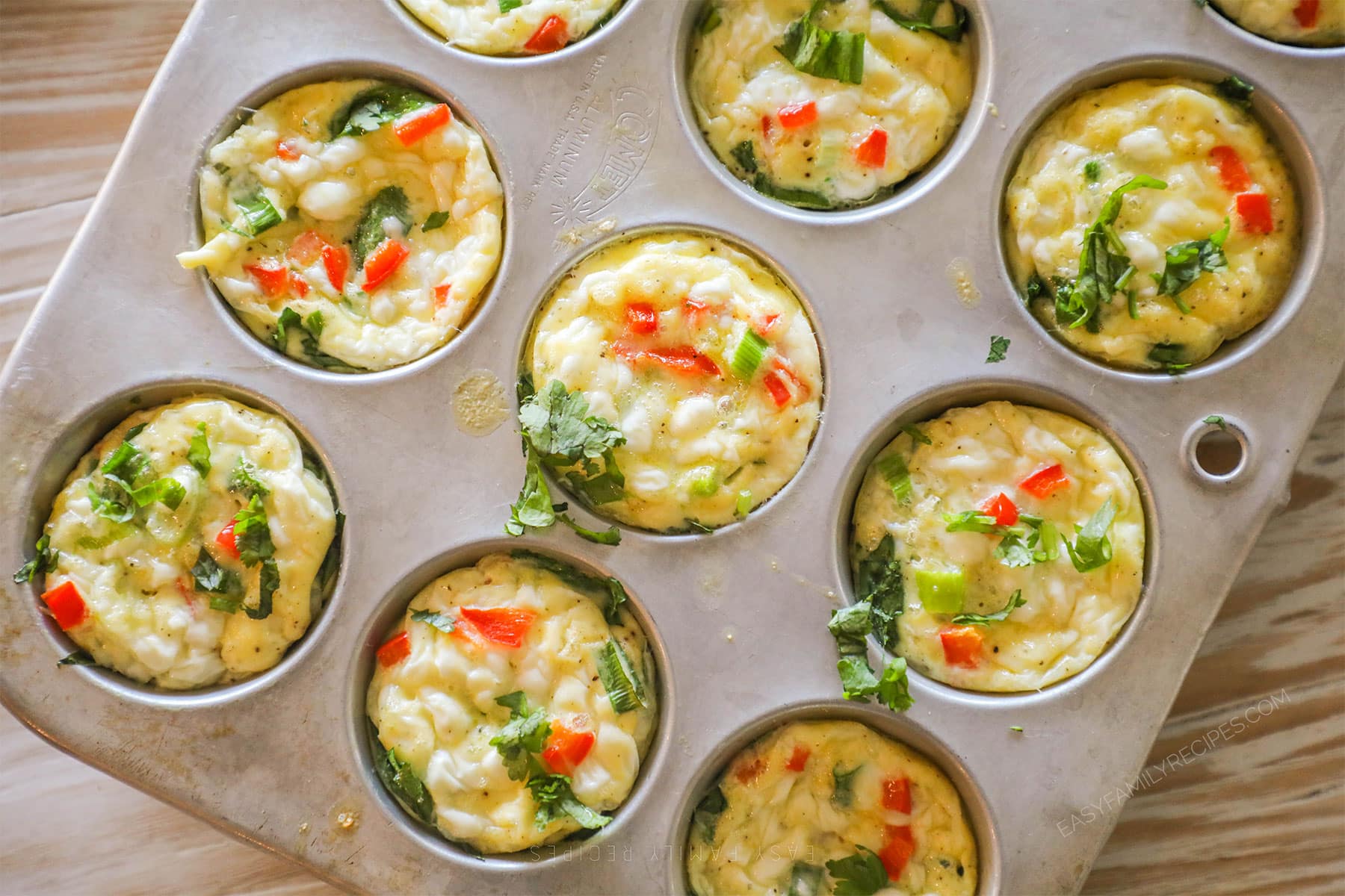 A top view of cottage cheese egg bites in a muffin pan.