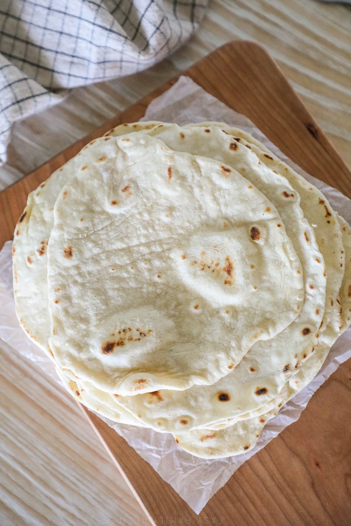 above image of a stack of homemade tortillas. 