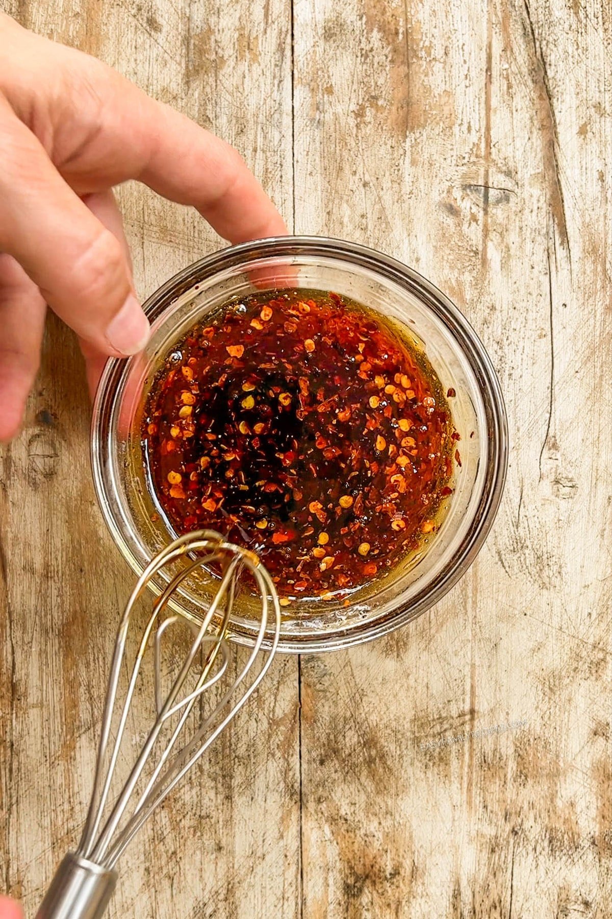 Step 5 for making hot honey chicken tenders: Mix up the hot honey mixture in a bowl.