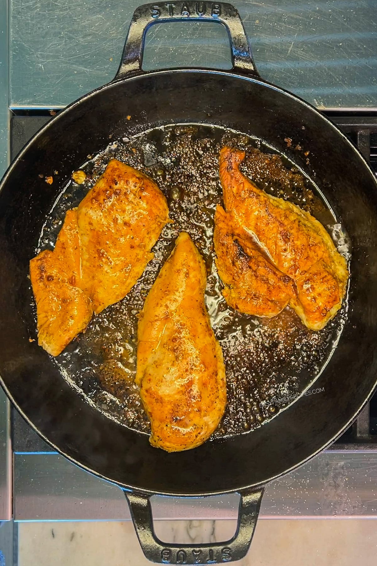 Step 2 of making chicken fajita bowls - cook the chicken in a skillet