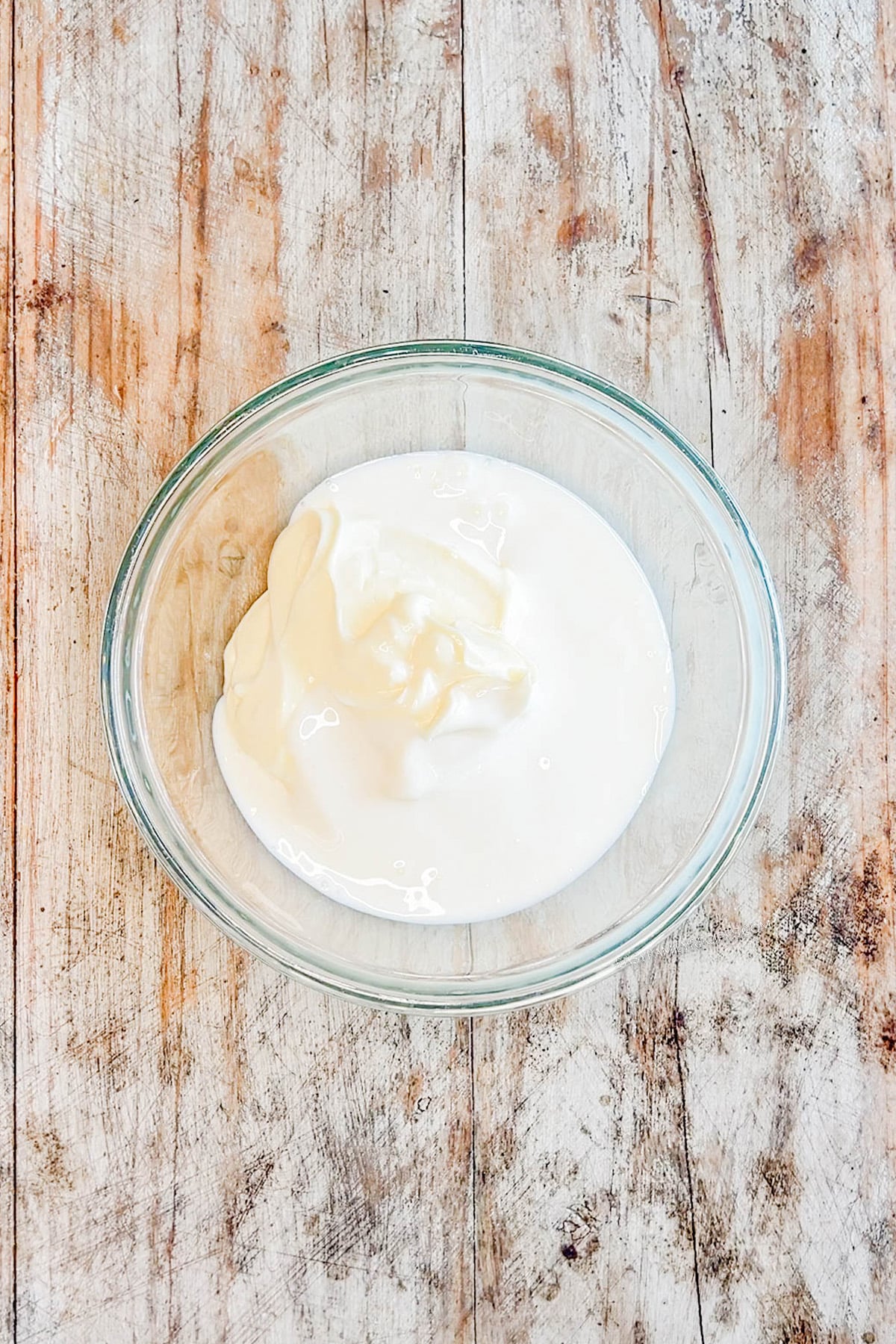 mayonnaise in a mixing bowl.