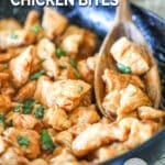 Honey BBQ Chicken Bites in a black skillet with a wooden spoon stirring them. The text reads, "Honey BBQ Chicken Bites"
