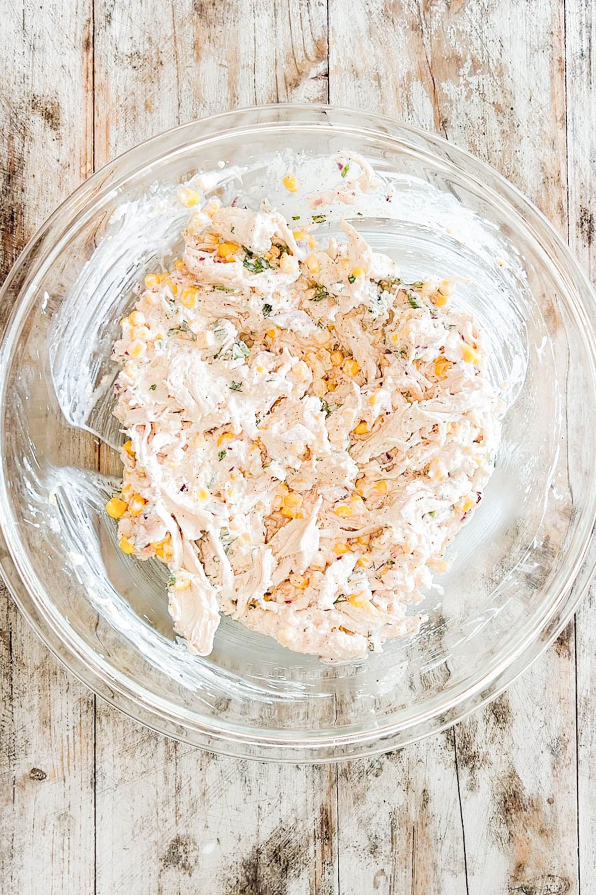 Street Corn Chicken Salad combined in a mixing bowl