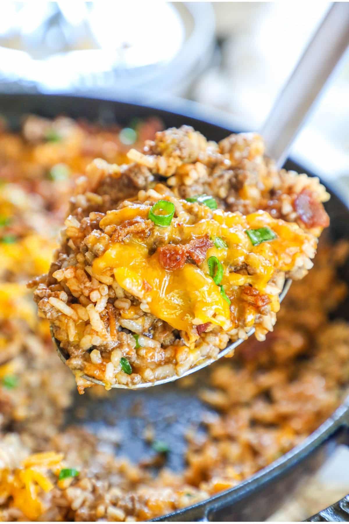 scoop of bacon cheeseburger rice from a skillet
