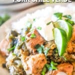 A serving of Crock Pot Chile Verde with rice, cilantro, and lime wedges on a white plate. The text reads, “Crock Pot Pork Chile Verde”