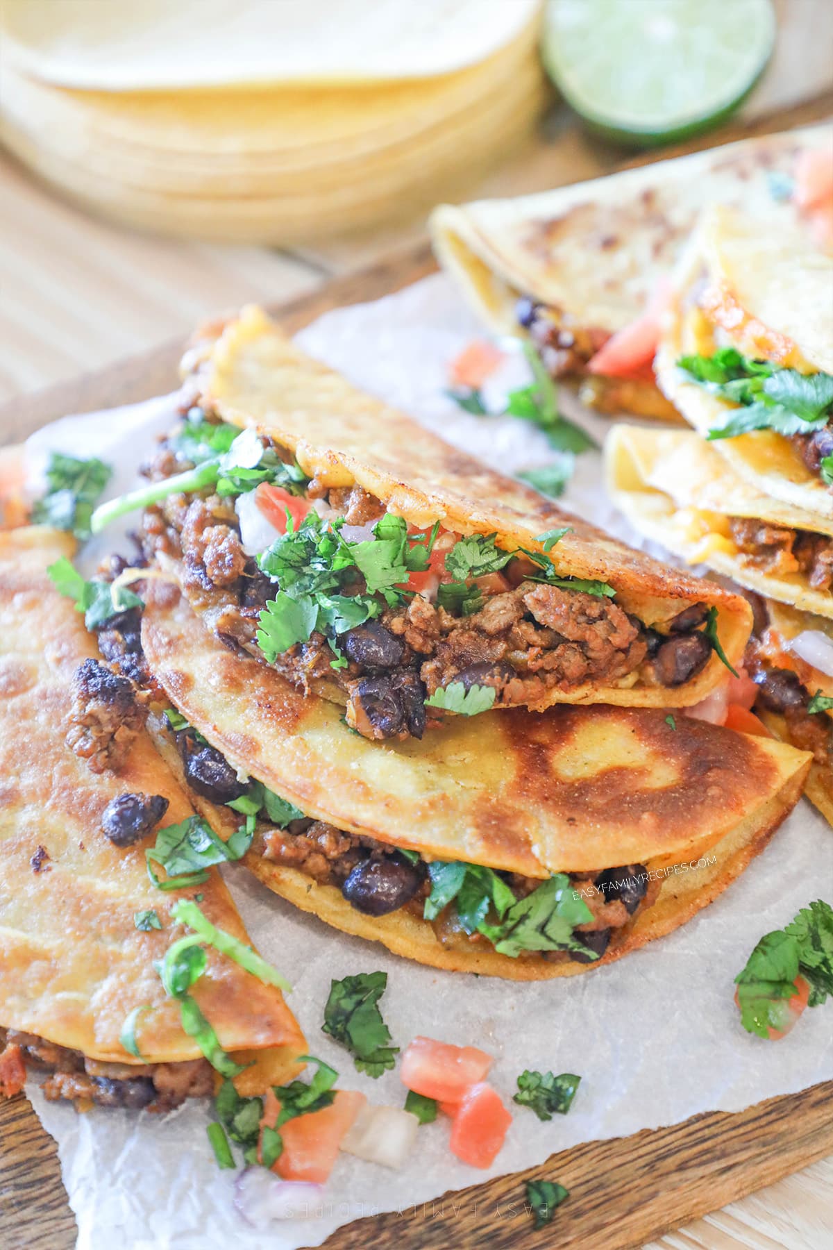 two assembled southwest beef fried tacos on a plate.
