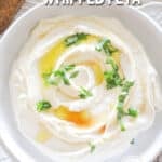 above image of feta dip topped with honey and basil.