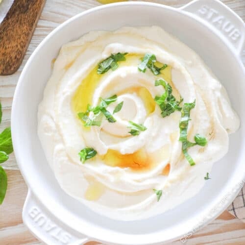 whipped honey feta dip topped with honey and fresh basil.