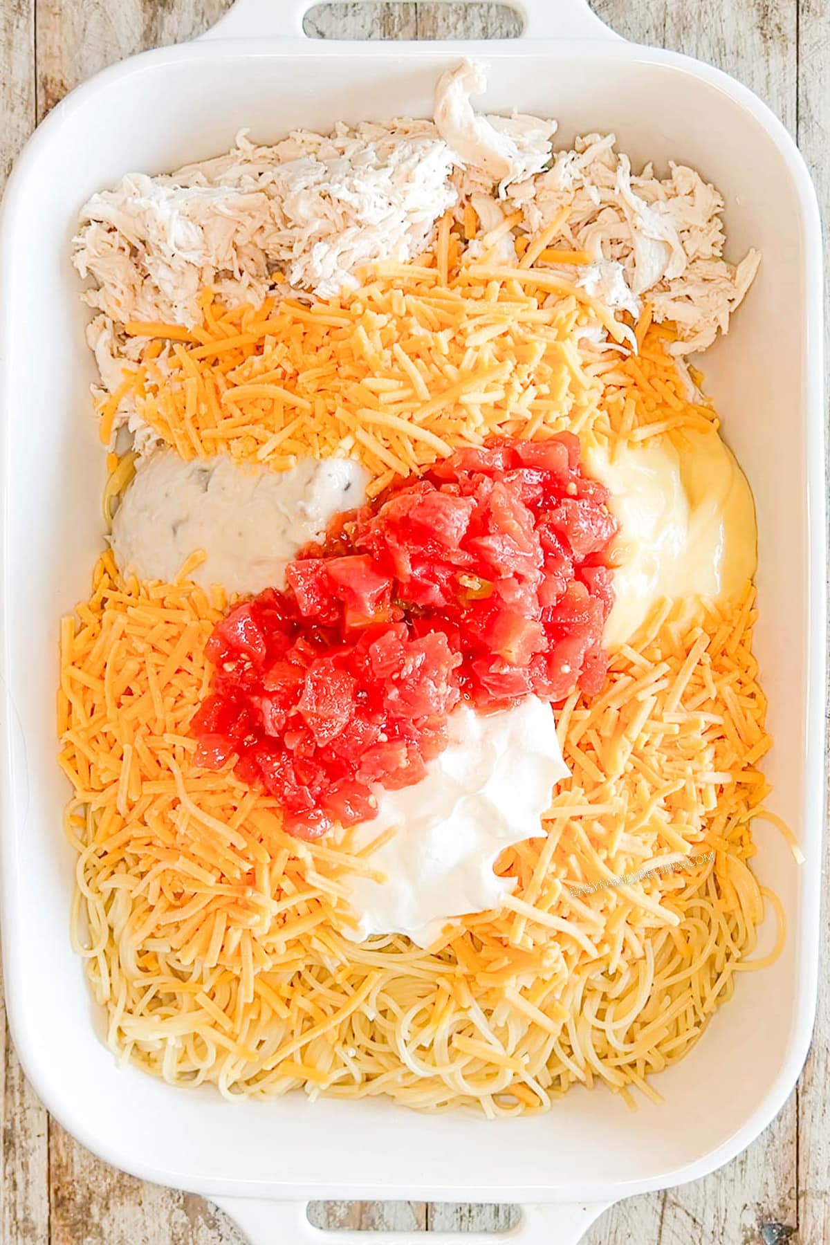 Step three for how to make baked chicken spaghetti: Add Rotel
