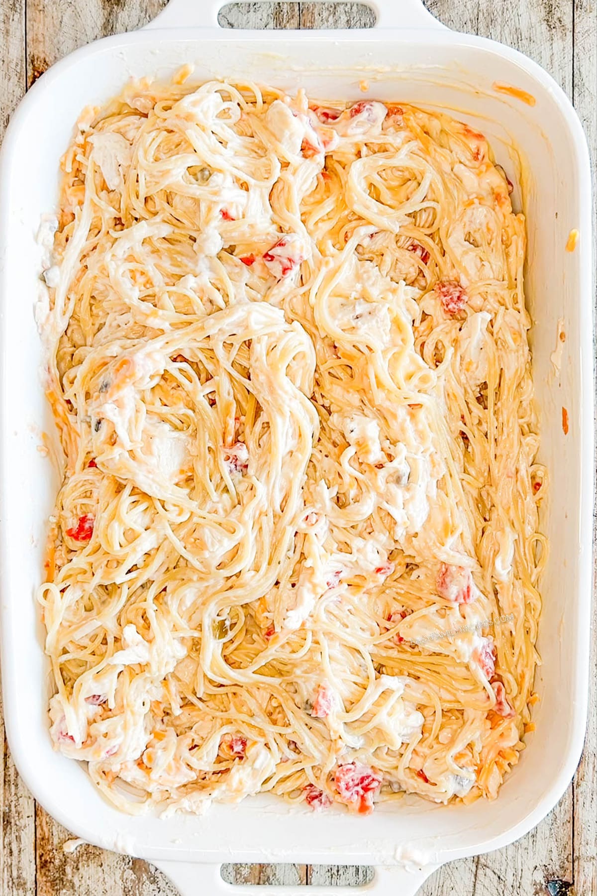 Step four for how to make baked chicken spaghetti: Stir it all together