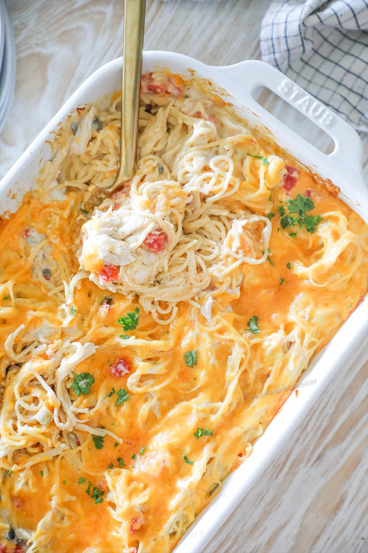 Step six for how to make baked chicken spaghetti: Bake until bubbly and warmed through.