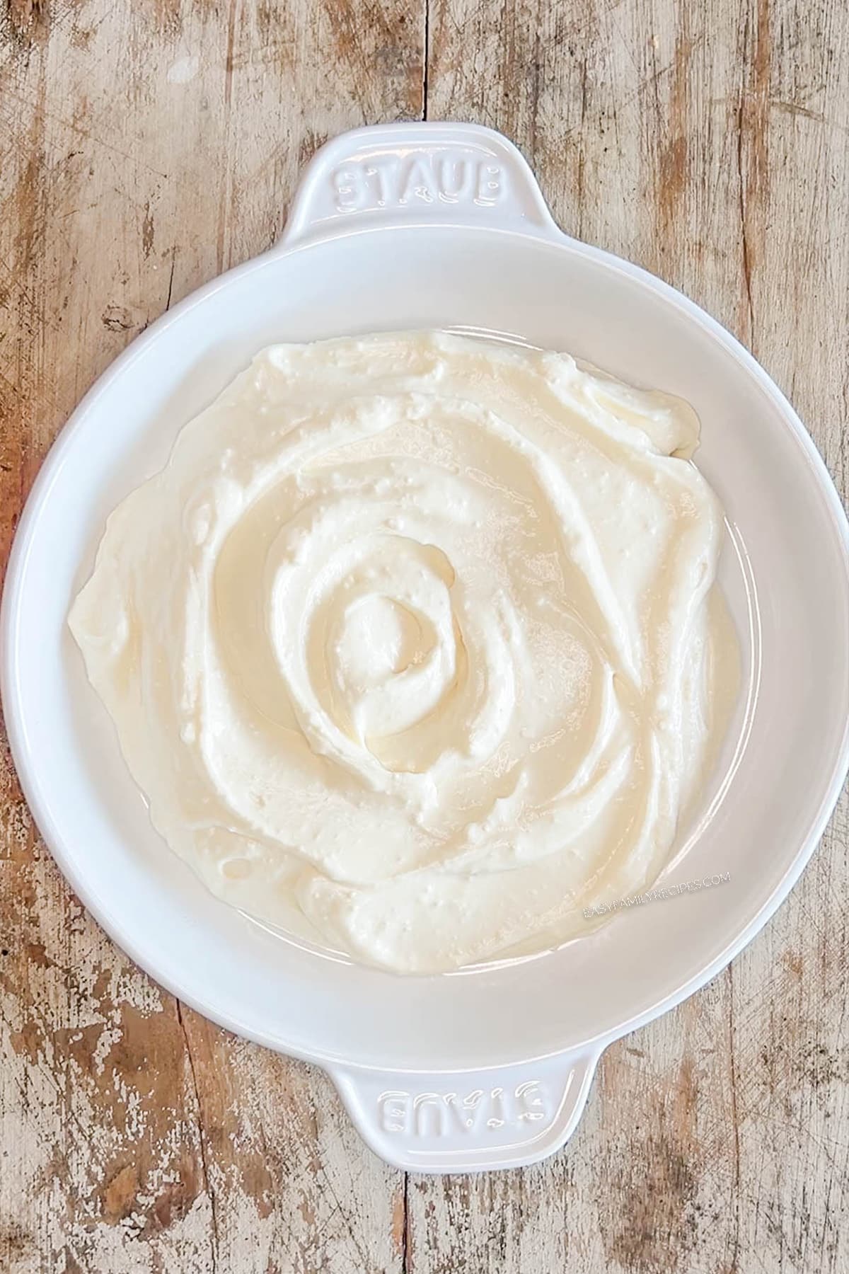 whipped feta and greek yogurt in a dish.