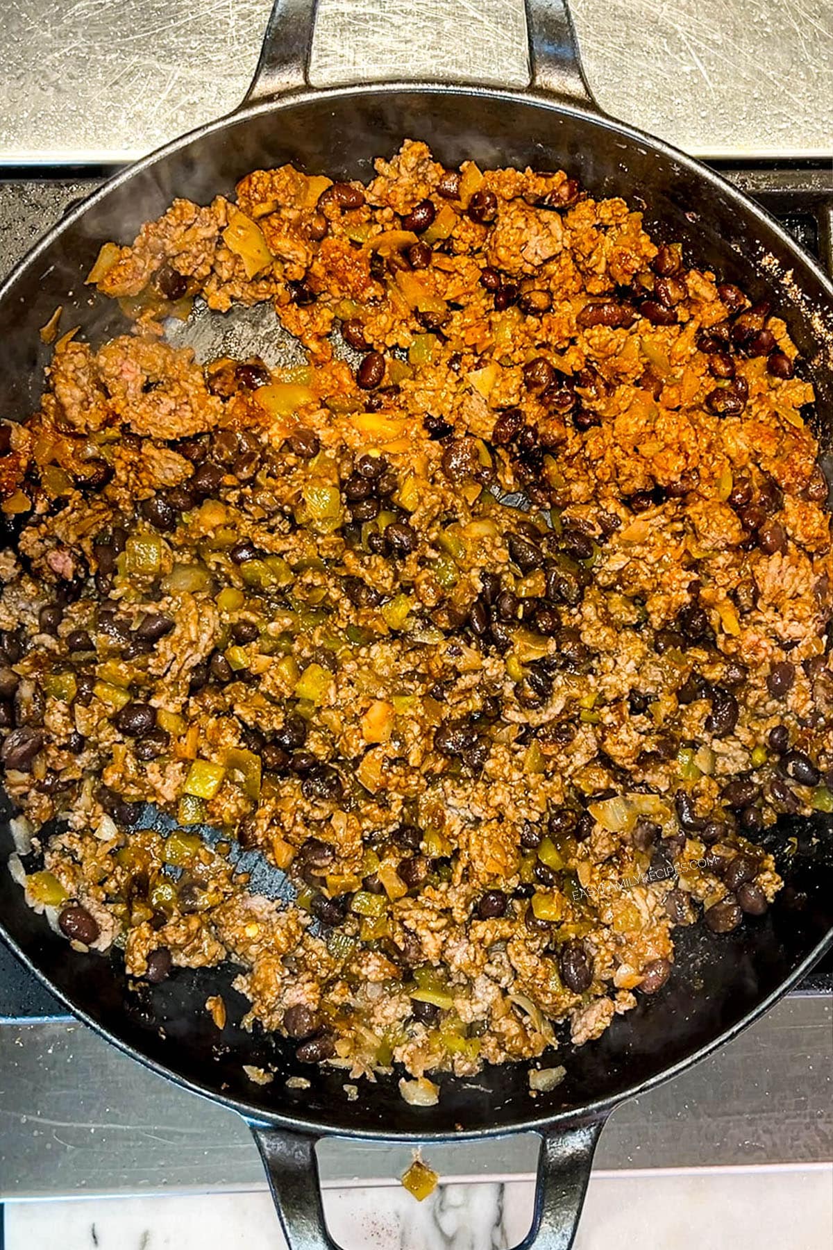 beef and bean taco filling in a skillet.