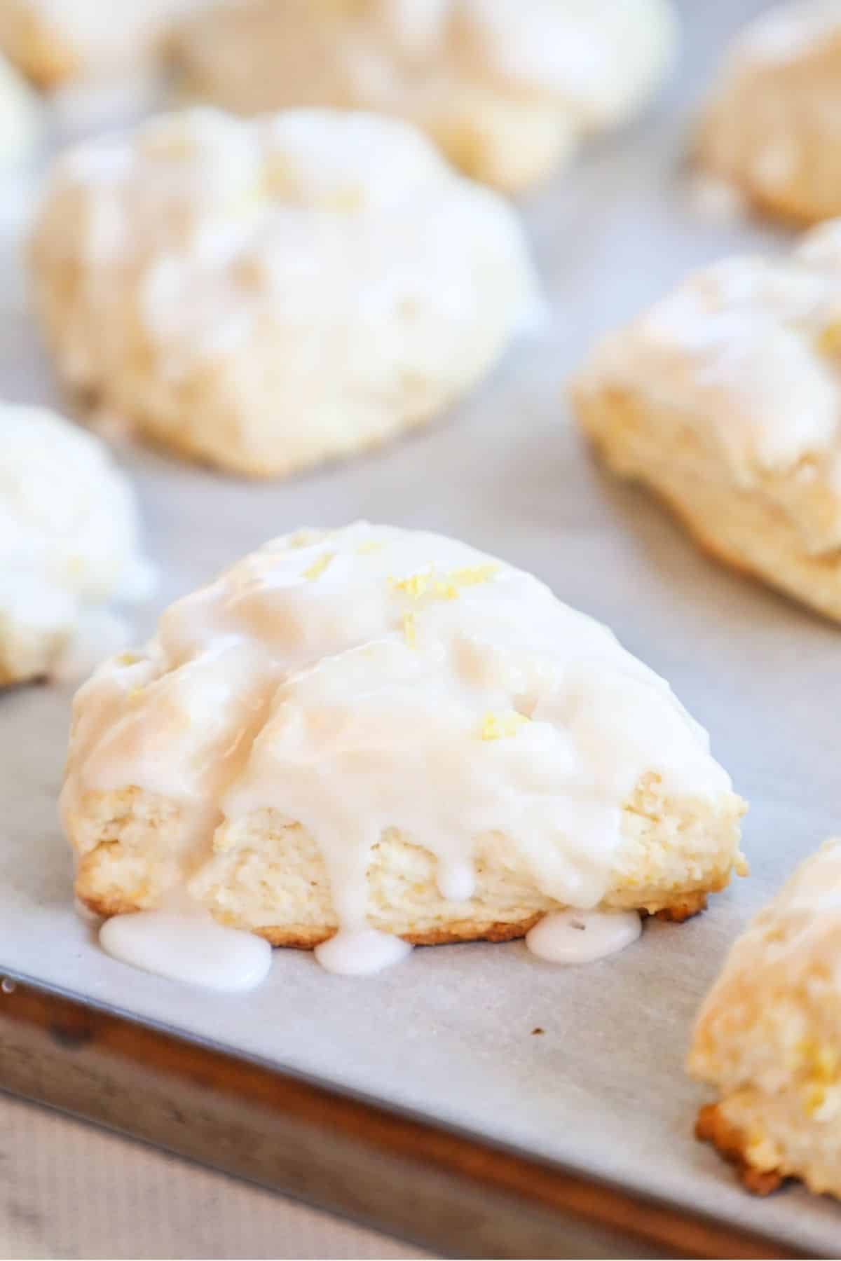 tray of lemon scones with a drizzle of white icing
