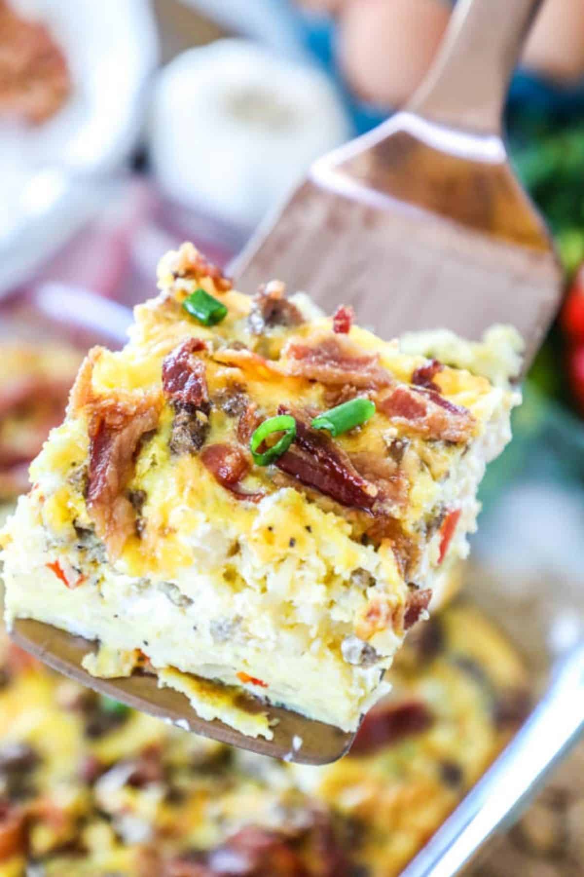 a serving of Sausage Breakfast Casserole on a spatula