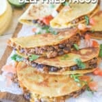 finished beef fried tacos on a plate.