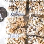 Top view of six Oreo Rice Krispie Treat bars. The text reads, "Cookies & Cream Rice Krispie Treats"