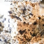 A stack of three Oreo Rice Krispie treats. The text reads, "Cookies & Cream Rice Krispie Treats"