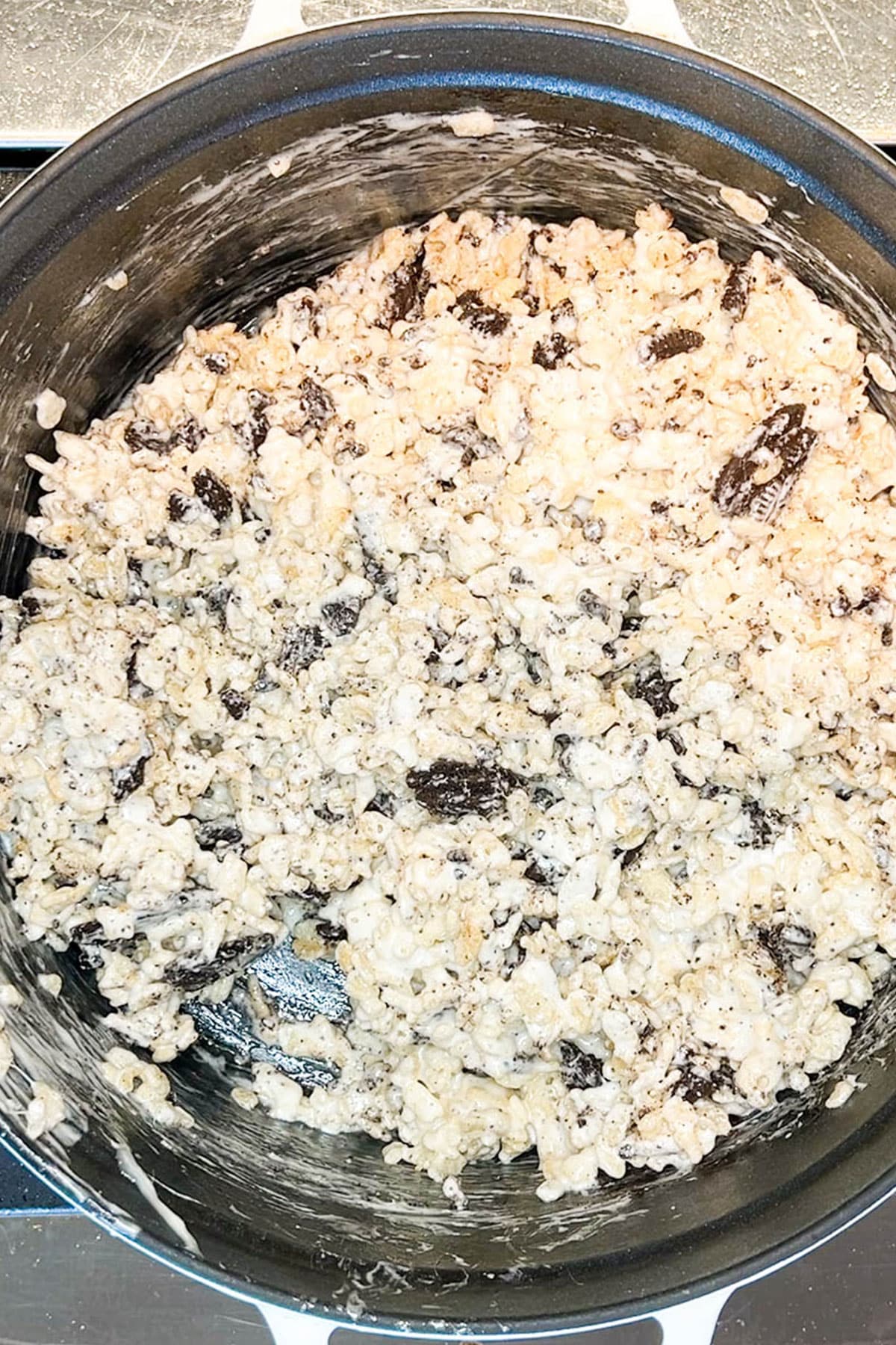 Mixing together the ingredients for Cookies & Cream Rice Krispie Treats