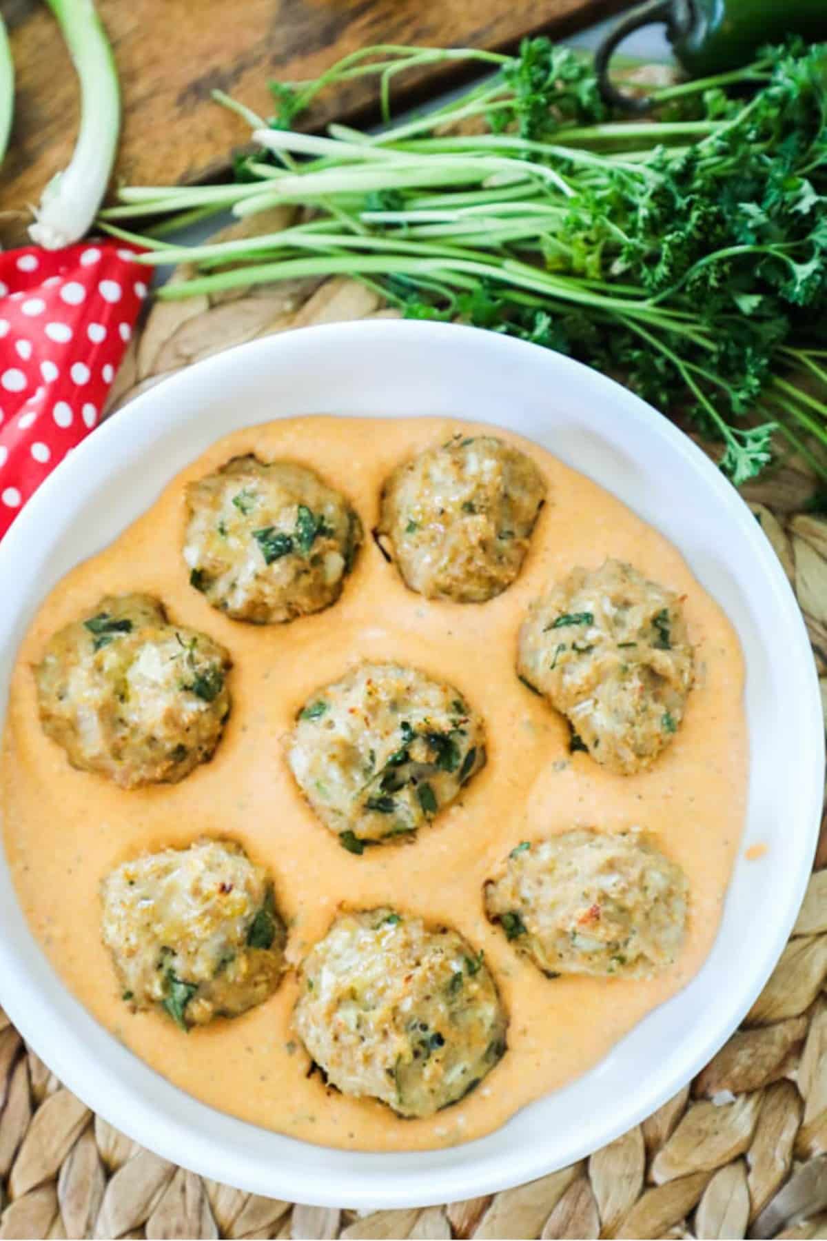 8 ground chicken meatballs in a buffalo ranch sauce
