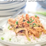 Bourbon chicken served over rice on a white plate. The text reads, "Slow Cooker Bourbon Chicken”