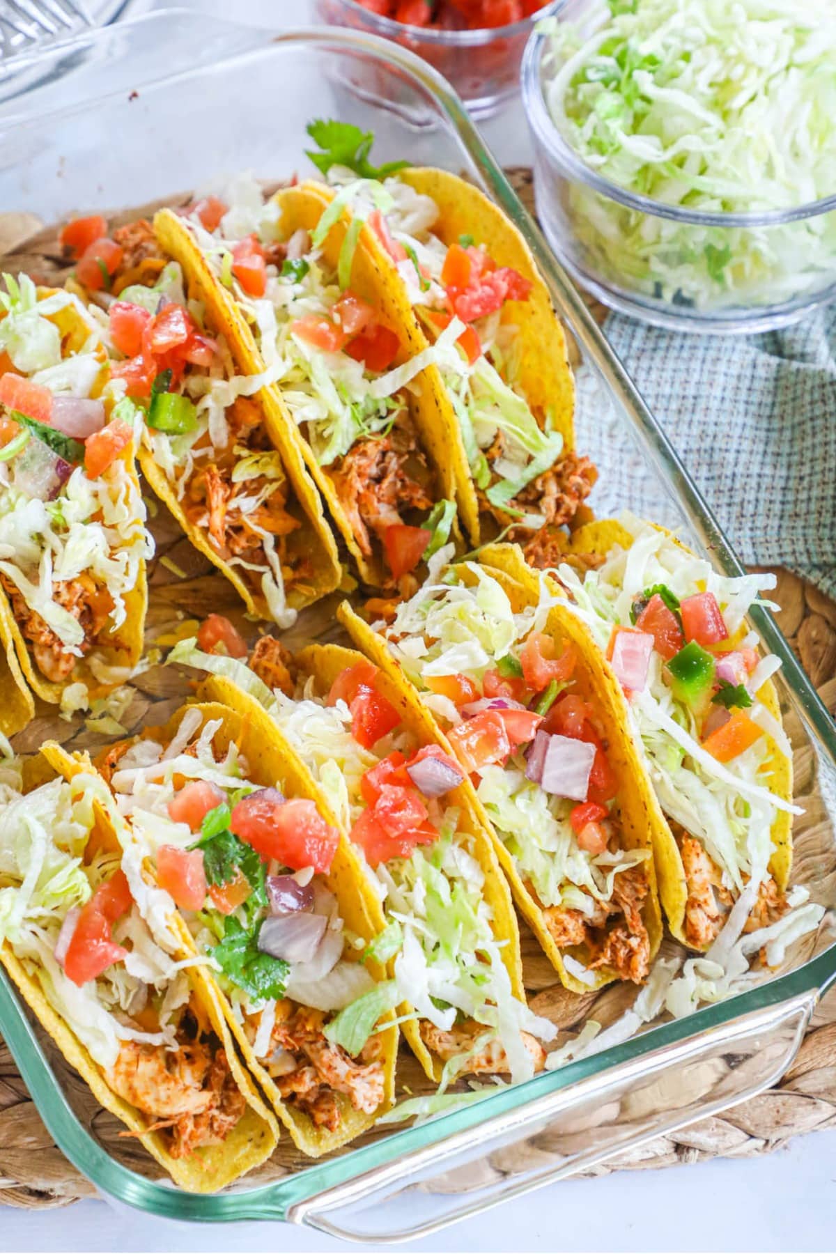ground chicken tacos lined up in a baking dish