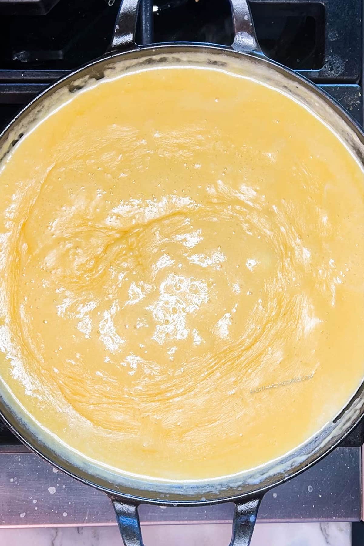 Step 4 for how to make Loaded Mac & Cheese with Ground Beef - stir in the cheese