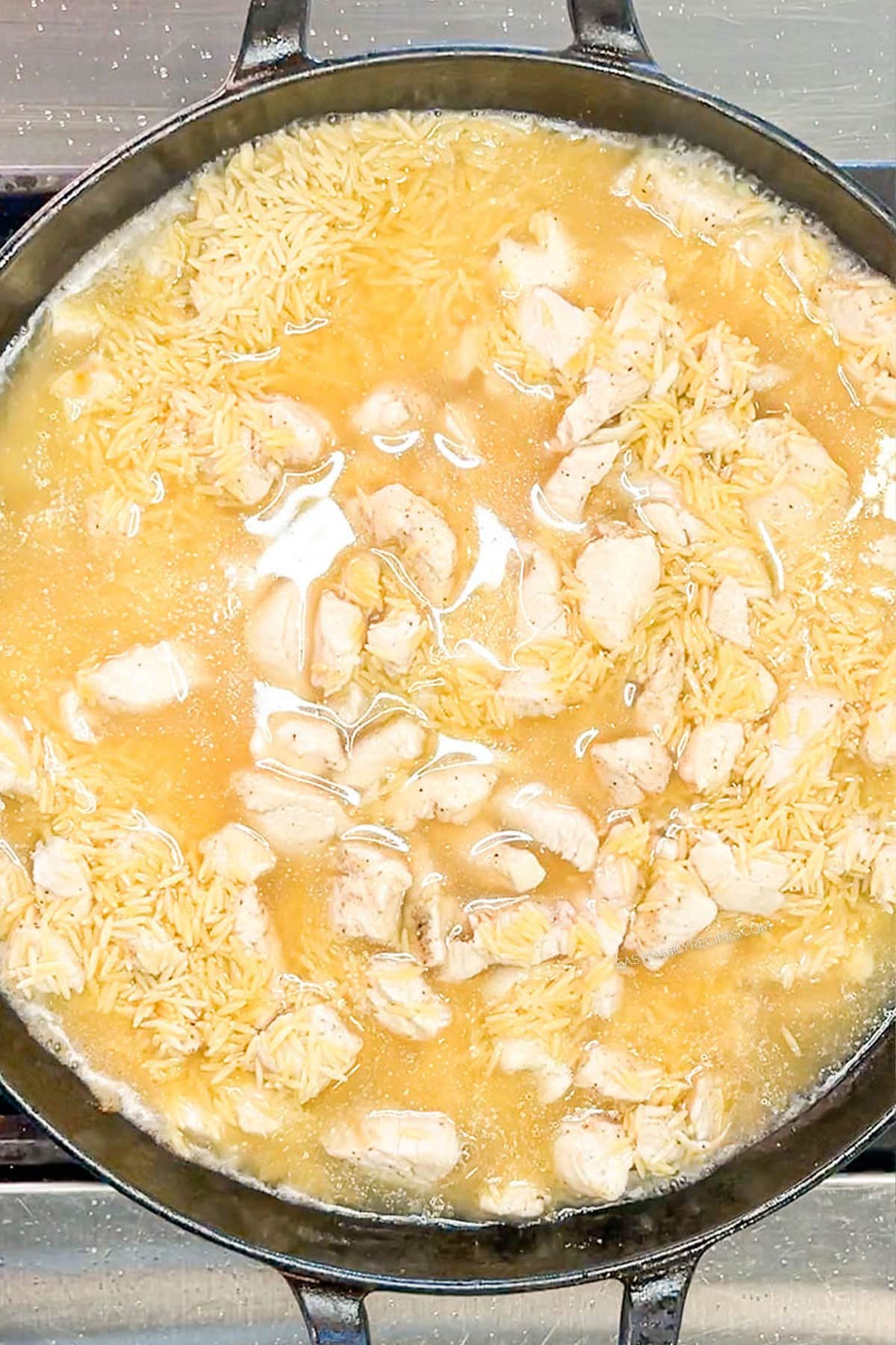 After cream, broth and orzo added.