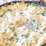 One pot spinach artichoke chicken orzo in a skillet.