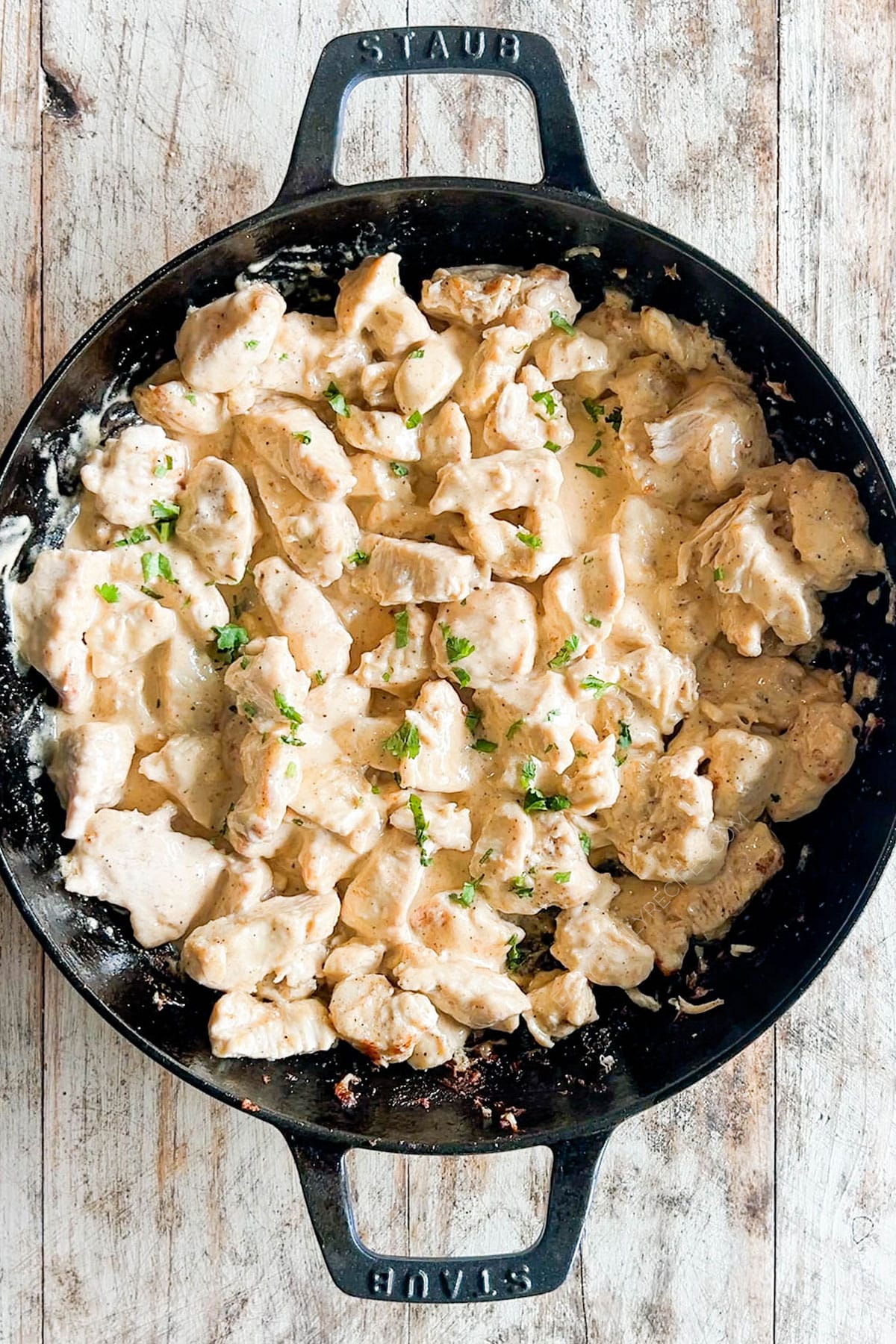 Step 4 for making bang bang chicken: Saute the chicken in a skillet.