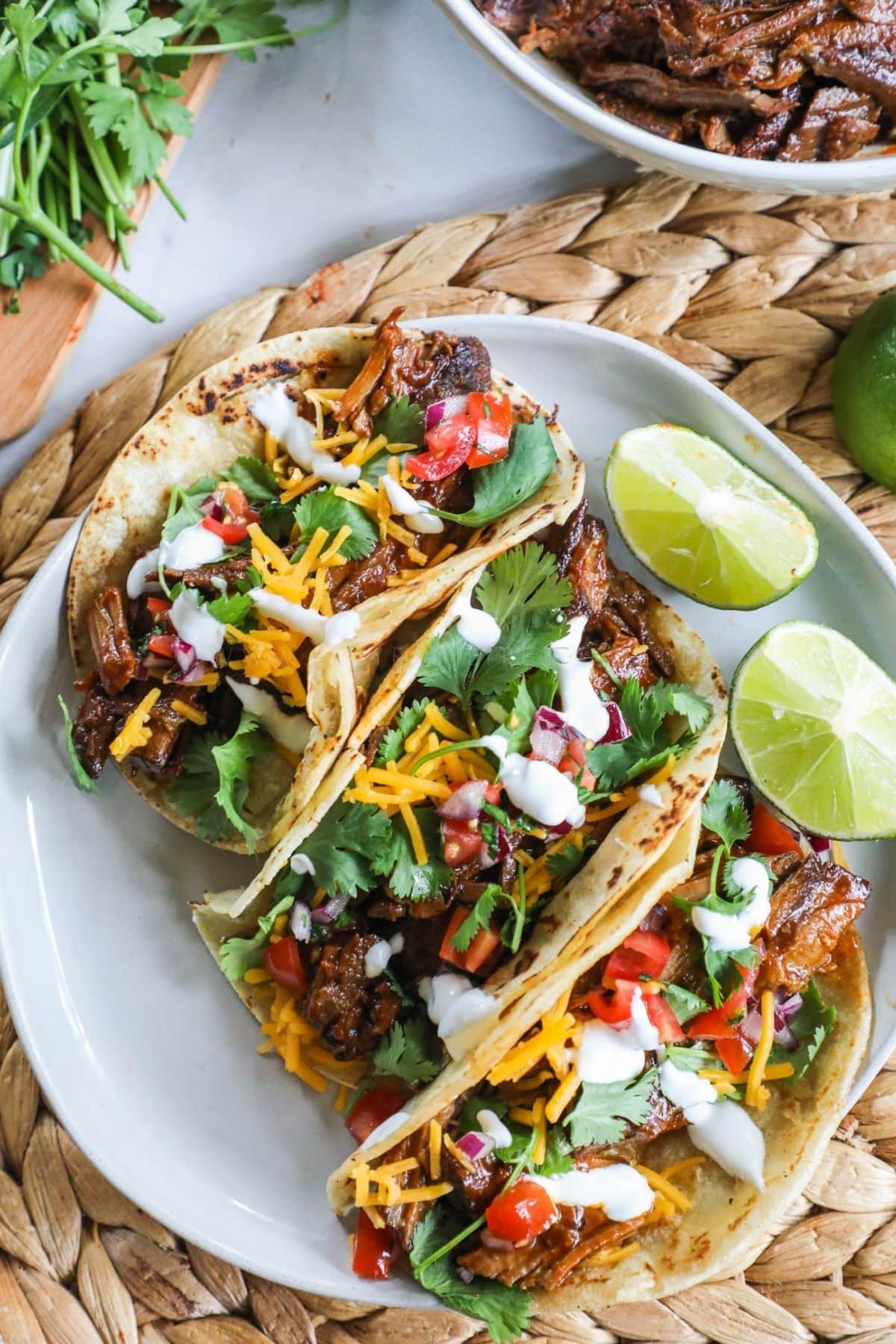 3 bbq brisket tacos on a plate