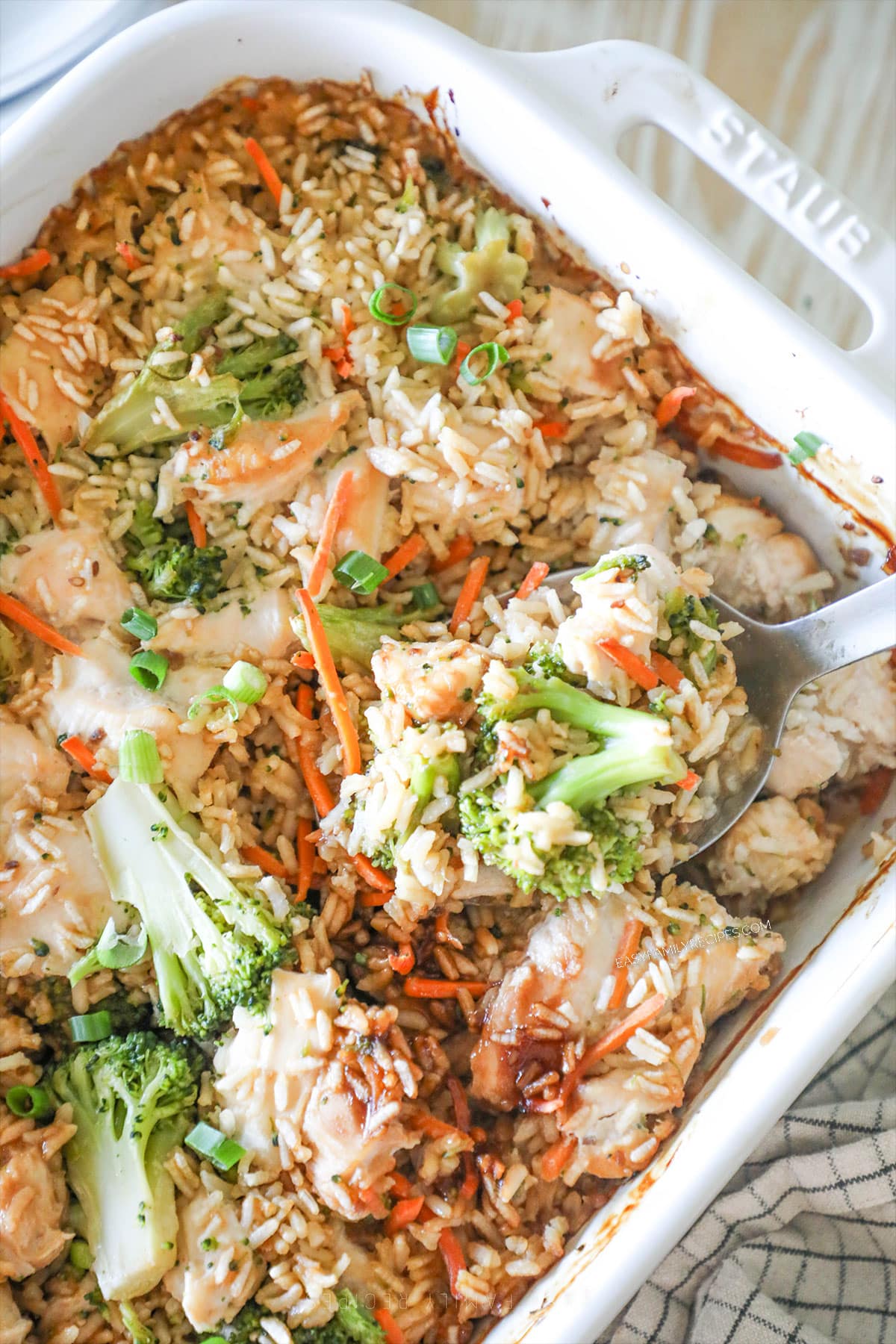 Top view of baked teriyaki chicken casserole in a white casserole dish