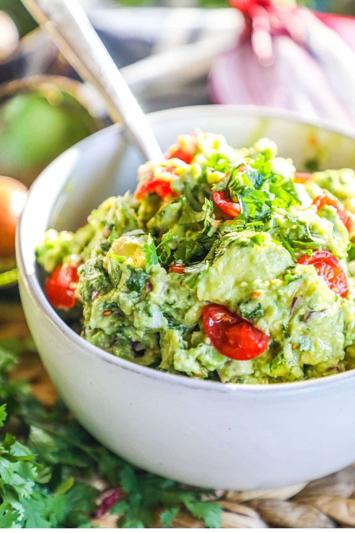 a white bowl filled with quacamole