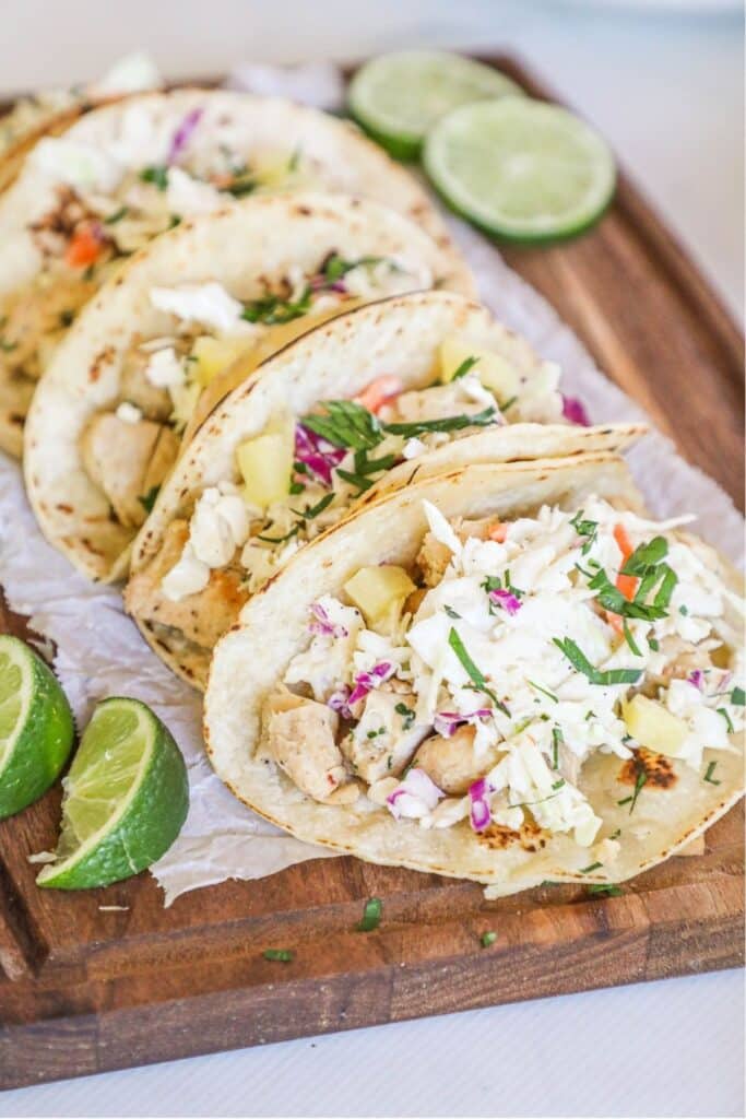 4 hawaiian tacos on a board