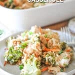 A serving of baked teriyaki chicken casserole on a white plate with a full casserole behind. The text reads, “Teriyaki Chicken Casserole”